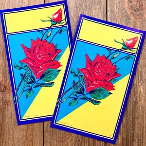 2 Vintage yellow and blue broom labels featuring a big red rose and rose buds.