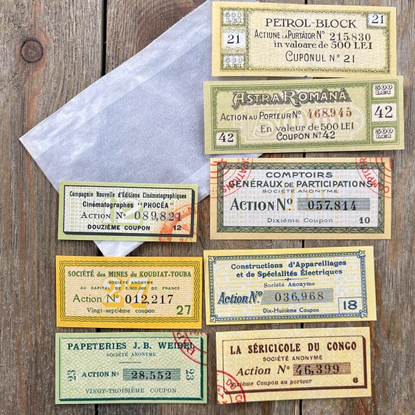 8 Different vintage French bond certificate coupons in shades of yellow and green