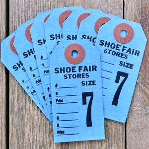 Eight vintage blue shoe tags