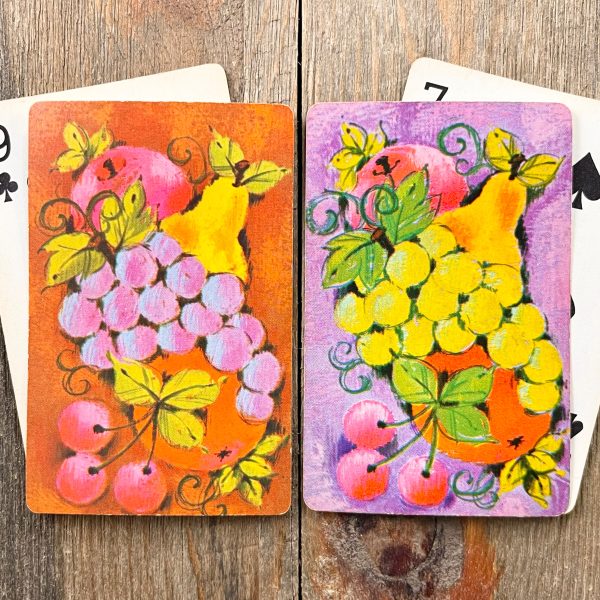Four vintage mixed fruit playing cards