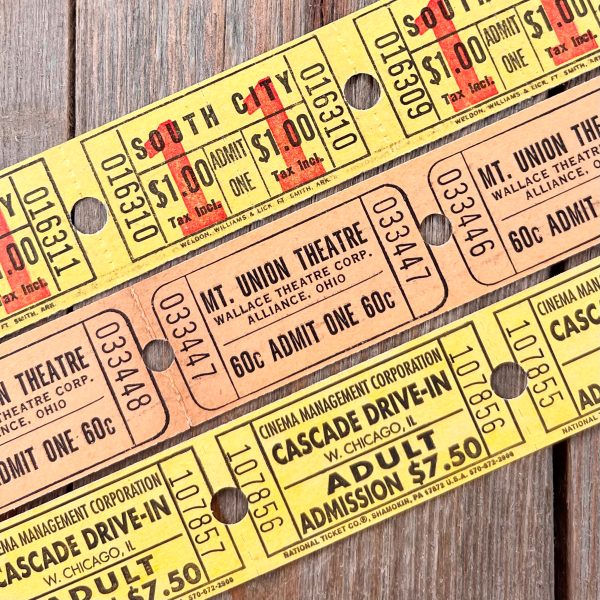 3 Rows of vintage movie theatre tickets in shades of yellow and beige