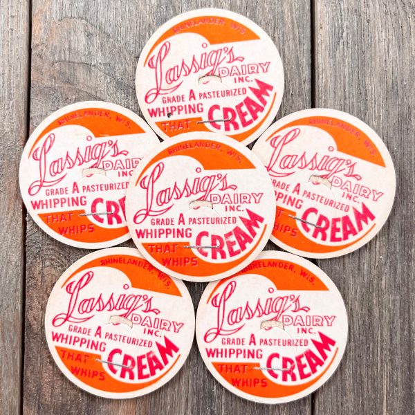 6 vintage red, orange and white whipping cream caps with a flourish style