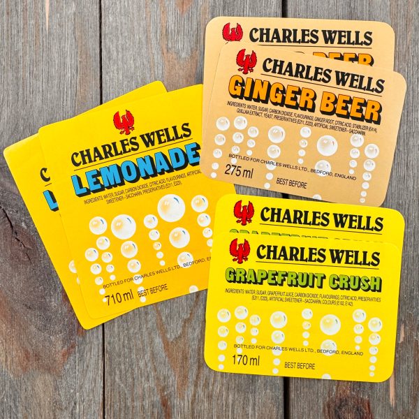 6 Assorted vintage Charles Wells brand soda labels - Lemonade, Ginger Beer, and Grapefruit Crush