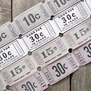 Four rows of vintage grey and white carnival tickets