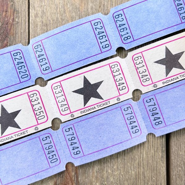 Three rows of vintage blank blue and white carnival tickets