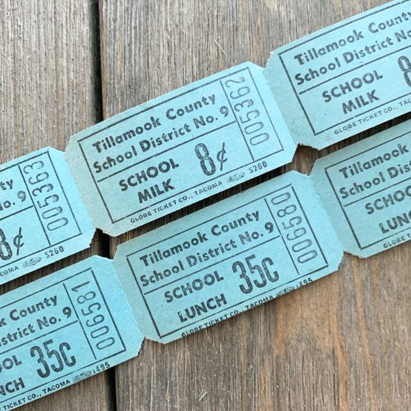 Two rows of vintage aqua blue school milk & school lunch tickets