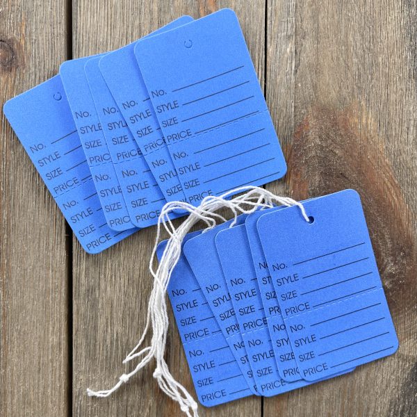 Ten assorted unstrung and strung dark blue clothing tags