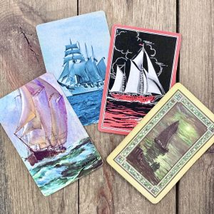 Four different vintage ship playing cards