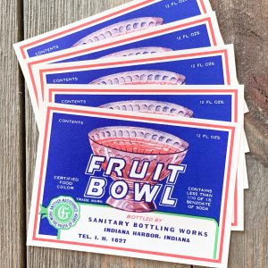 Five vintage red, white and blue Fruit Bowl soda labels with a punch bowl illustration