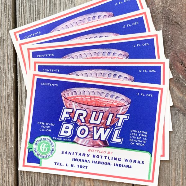 Five vintage red, white and blue Fruit Bowl soda labels with a punch bowl illustration