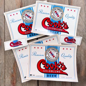 Six assorted vintage Cook’s Beer labels