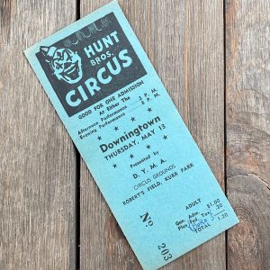 One vintage turquoise blue Hunt Bros Circus ticket featuring a laughing clown