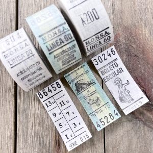 Three rolls of vintage teal and white bus tickets from Argentina