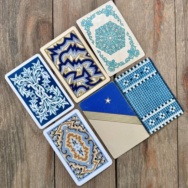 Six different vintage blue patterned playing cards