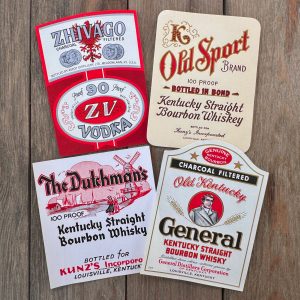 Four different vintage red and white liquor labels from the 1940s