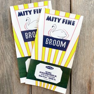 Two vintage Mity Fine Broom labels featuring an illustration of a white swan