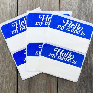 Six vintage blue and white “Hello my name is” stickers