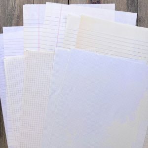 Ten assorted vintage letter and legal size lined and graph papers